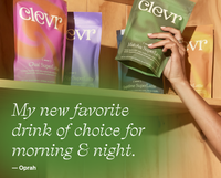 Hand picking a Clevr SuperLatte bag from a shelf and featuring a quote by Oprah. "My new favorite drink of choice for morning & night." - Oprah