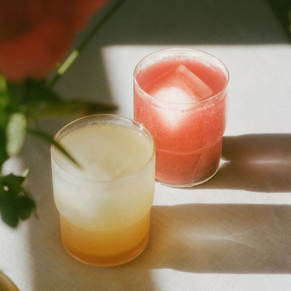 Two Clevr SuperTeas in glasses with ice