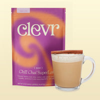 Clevr Chill Chai Superlatte bag with a glass of chai on a beige background