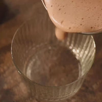 Clevr SuperLatte pouring into a glass